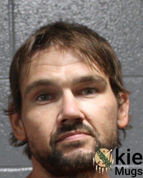 Booking photo of Corey Michael Shea