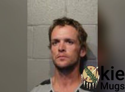 Booking photo of John Carl Warner