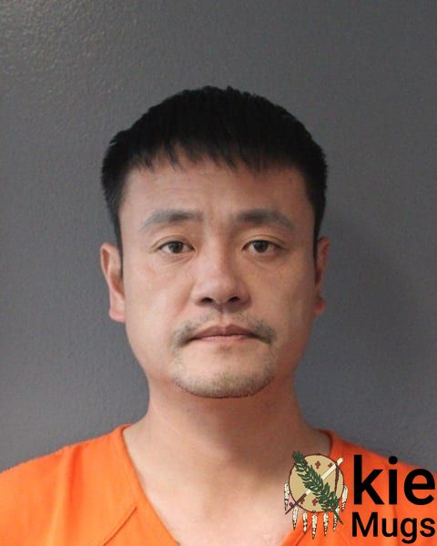 Booking photo of Yu Zheng