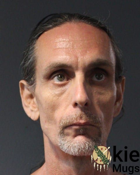 Booking photo of Justin Blayne Sneed