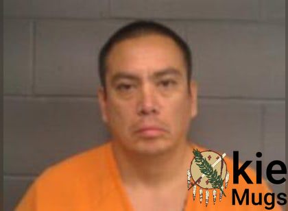 Booking photo of Justin Lynn Cummings