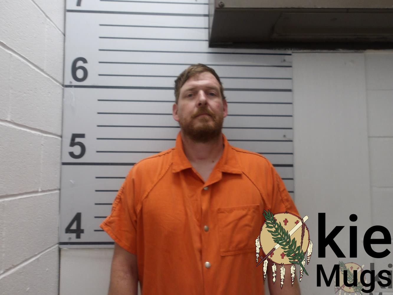 Booking photo of Adrian Michael Miller
