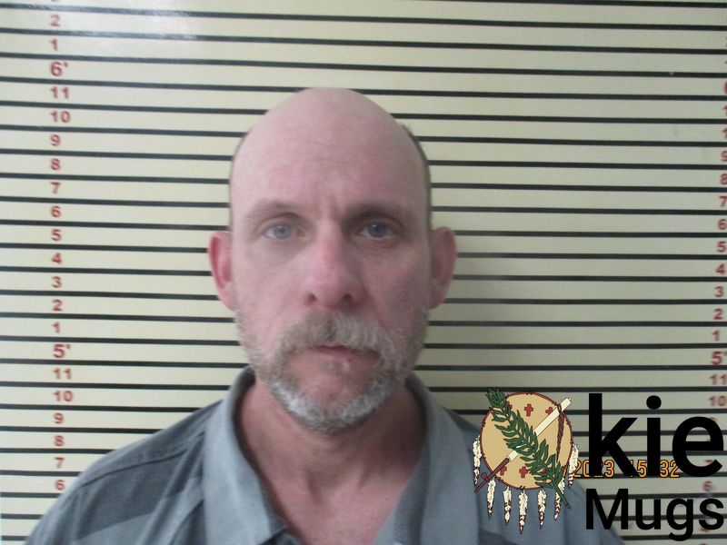 Booking photo of AARON WOOTEN