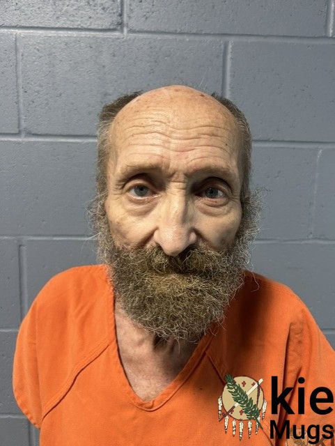 Booking photo of John Nichols