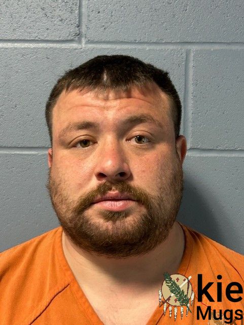Booking photo of AUSTIN MUNS
