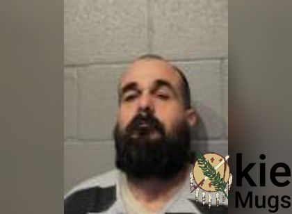 Booking photo of John Travis Gomez