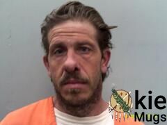 Booking photo of JOHN DANIEL ARNETT