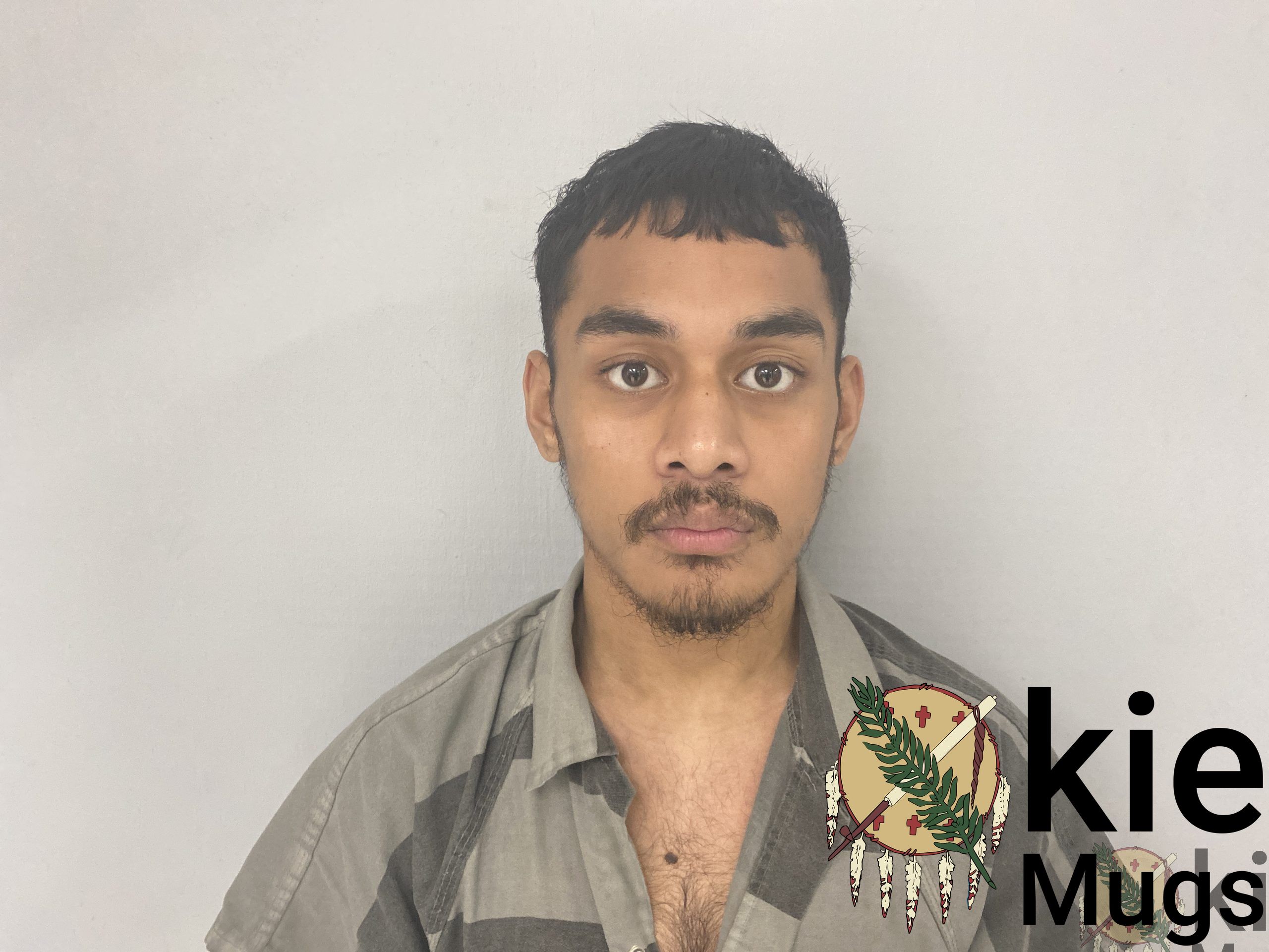 Booking photo of Sikra Andrew