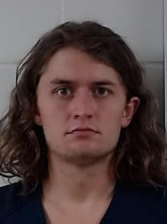 Booking photo of AARON JAMES BREWER