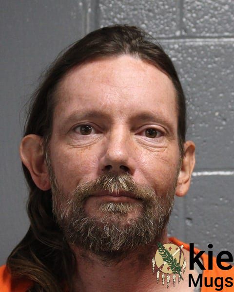 Booking photo of Justin Charles Miller