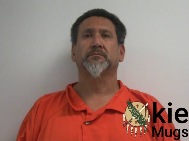 Booking photo of Reginald Myron Benson
