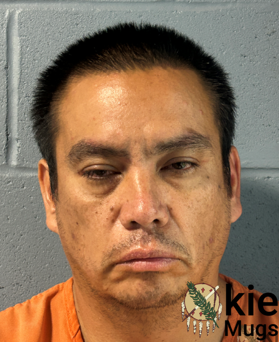 Booking photo of Justin Cummings