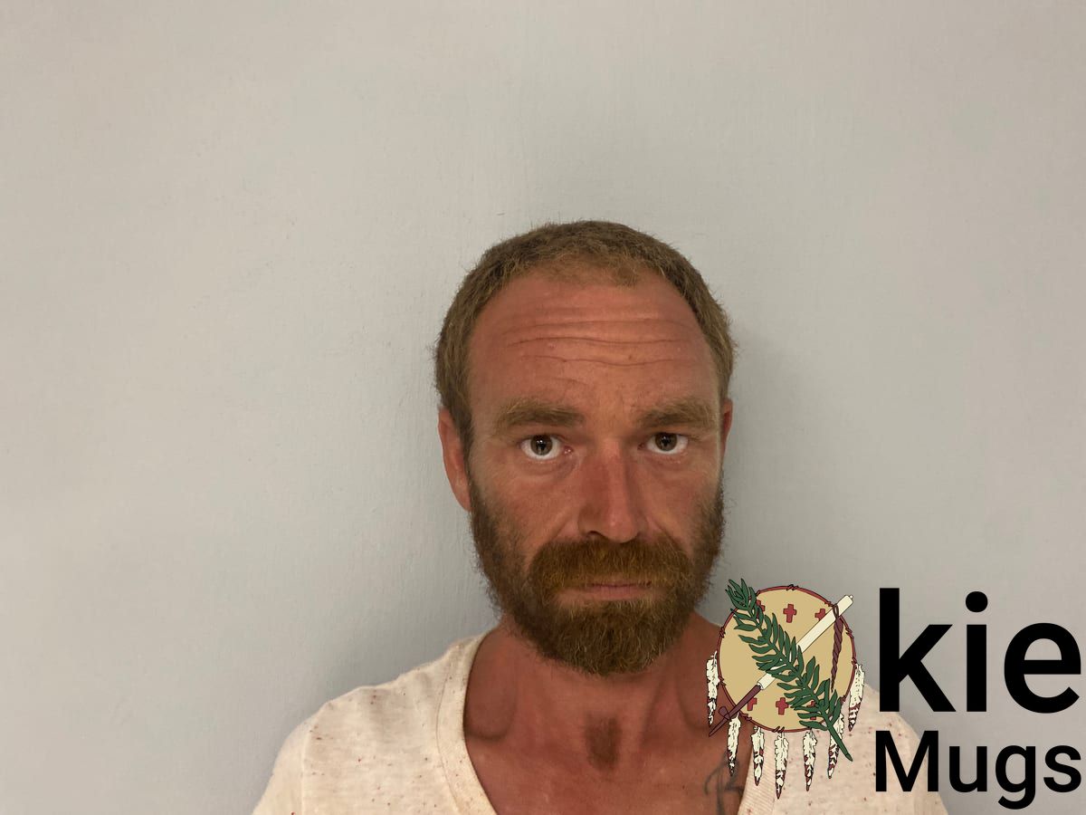 Booking photo of James Genson
