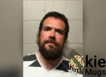 Booking photo of Caleb Andrew Burkett