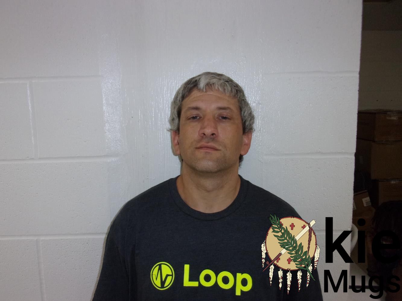 Booking photo of AARON BRUCKER