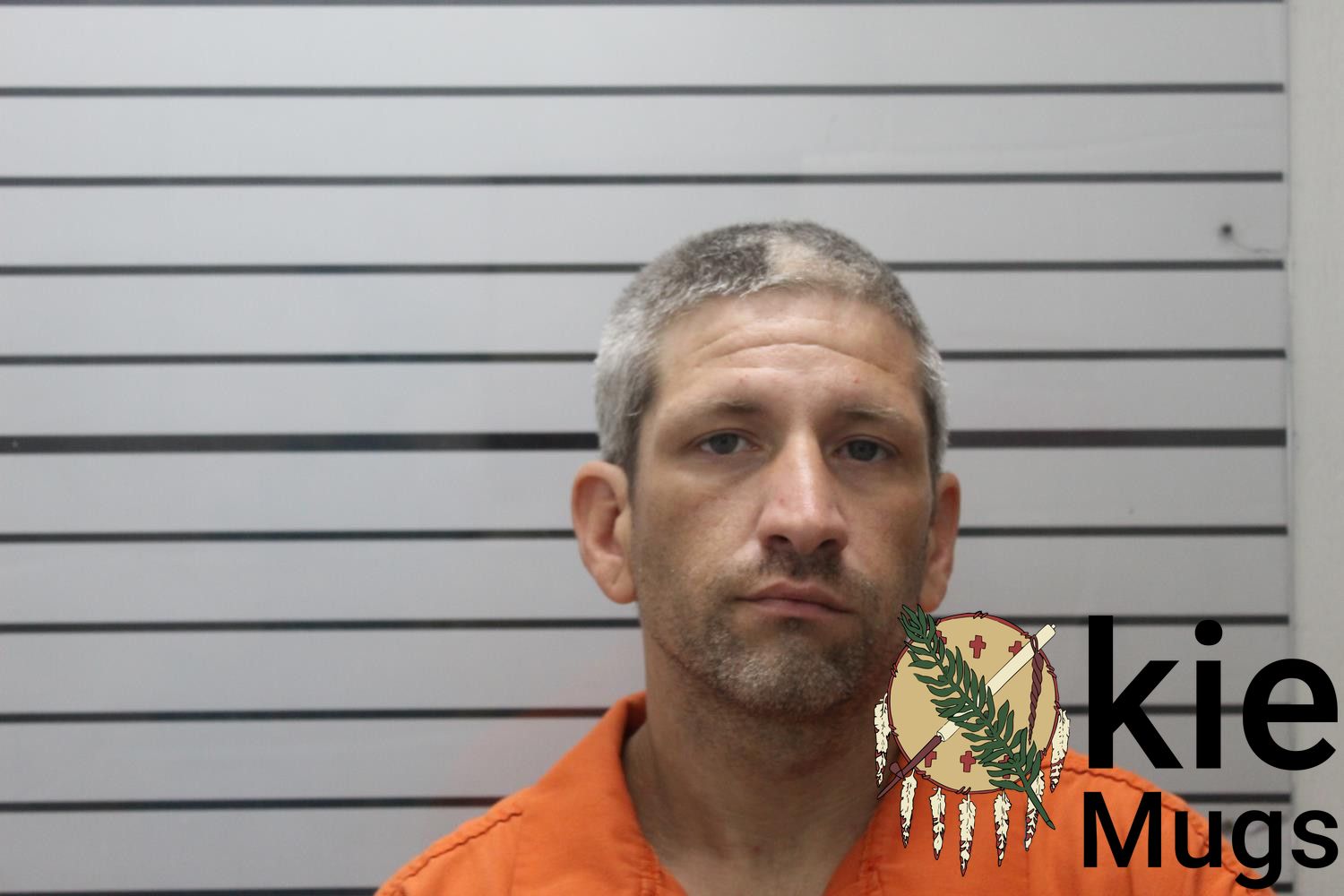 Booking photo of AARON (CREEK) BRUCKER