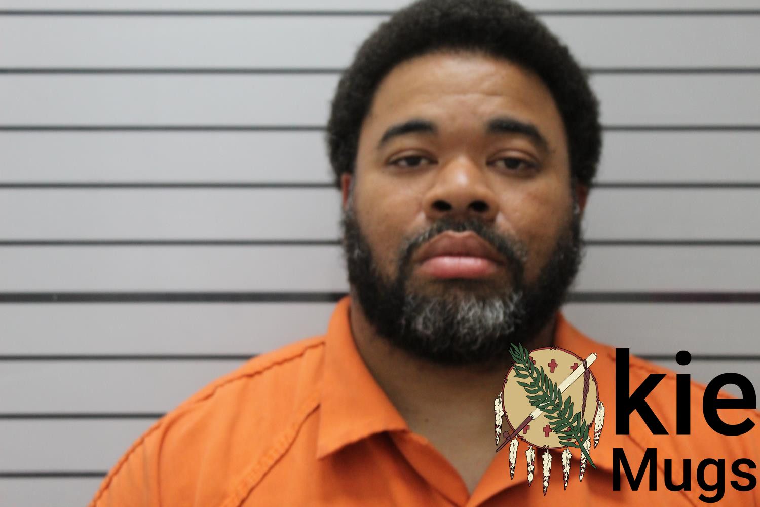 Booking photo of ADRIAN BREWER