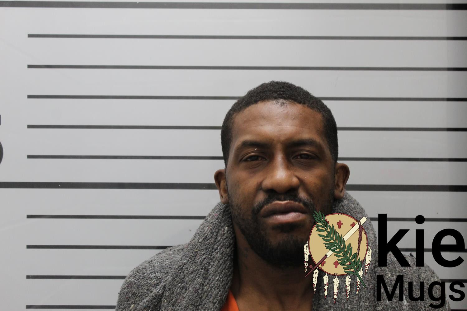 Booking photo of ADRIAN J. SMITH