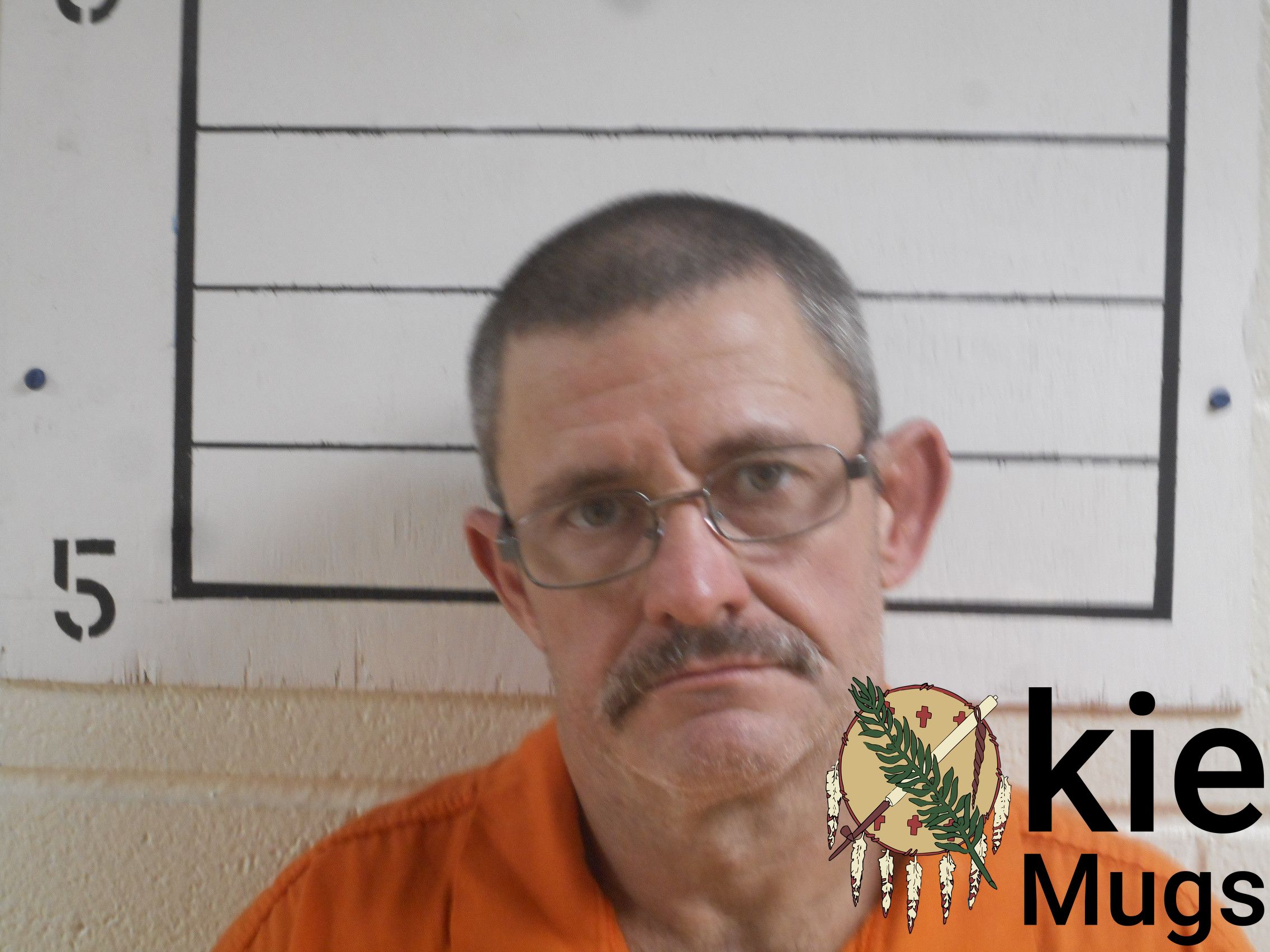 Booking photo of CARMON EMBER JR. (DOC) WATTS