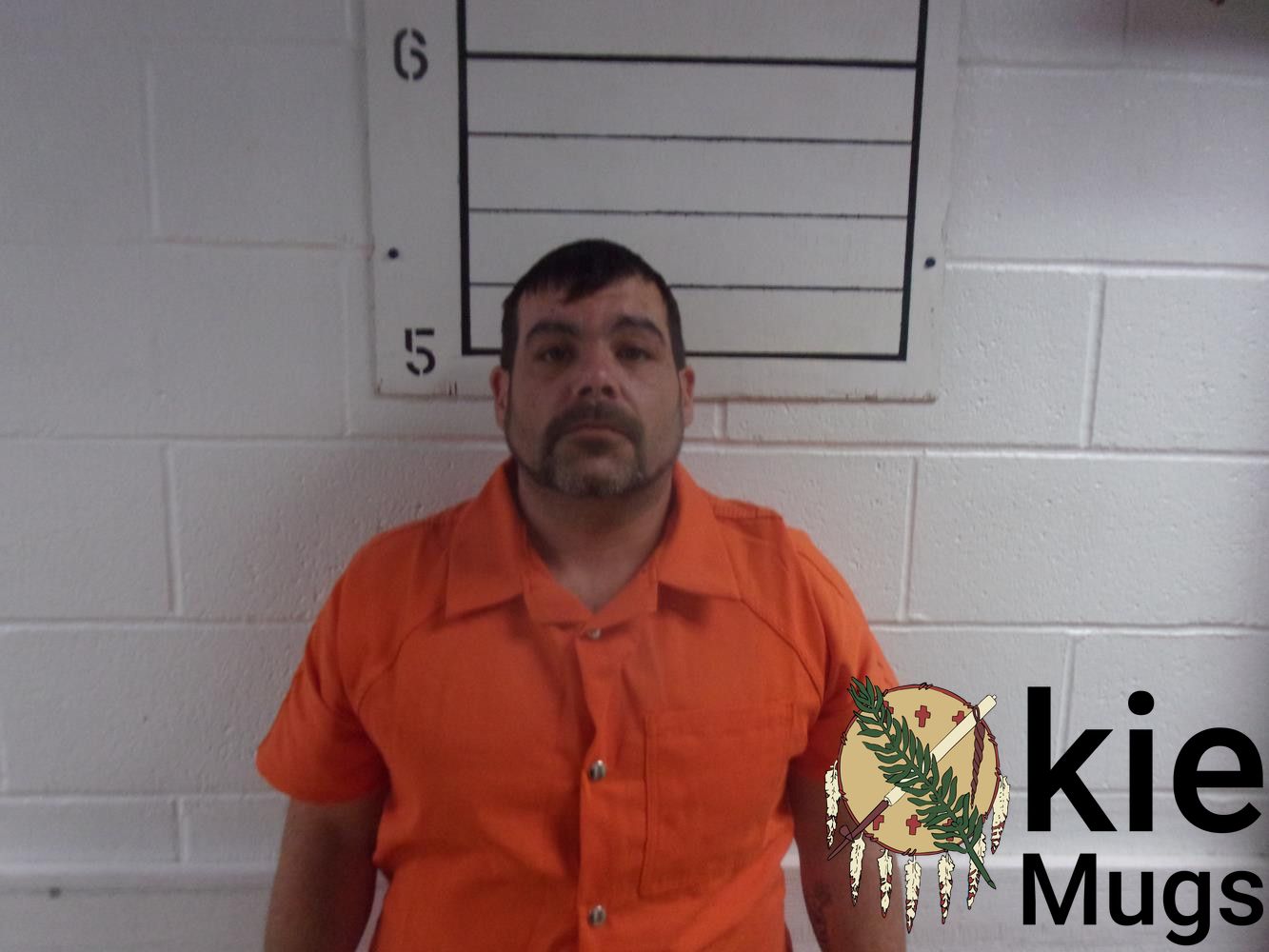 Booking photo of CHRISTOPHER HUSMAN