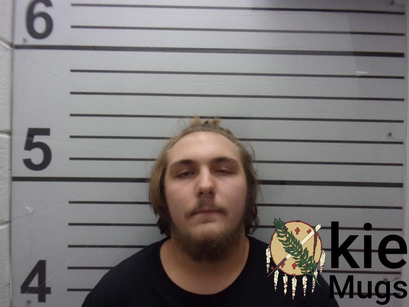 Booking photo of COREY MICHAEL BURNS JR