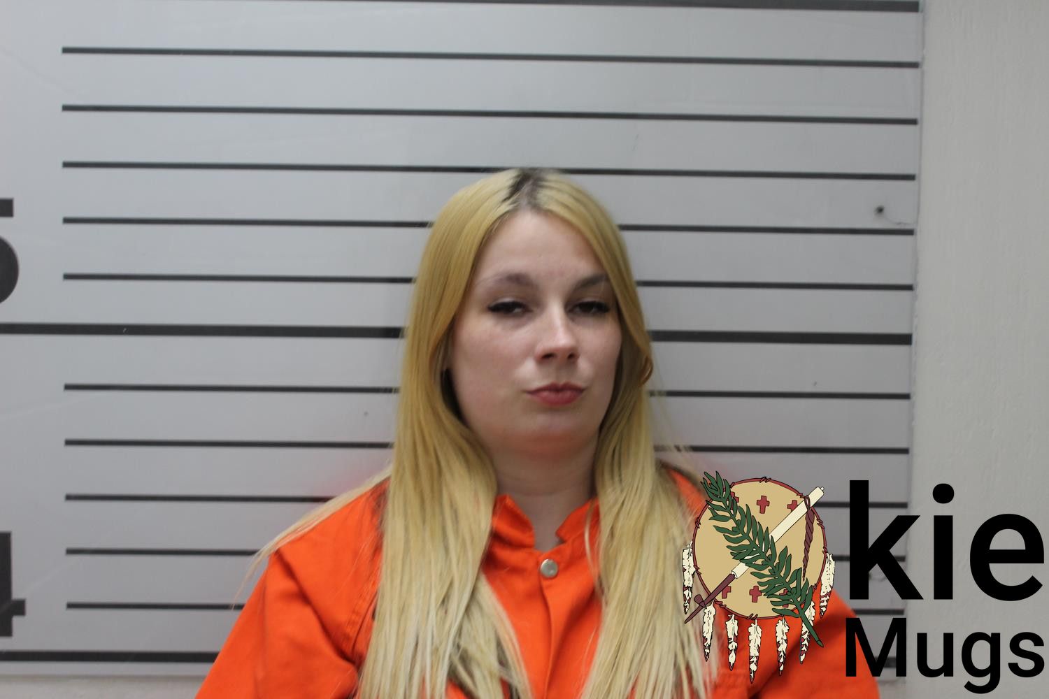 Booking photo of COURTNEY DANIELLE TAKASH