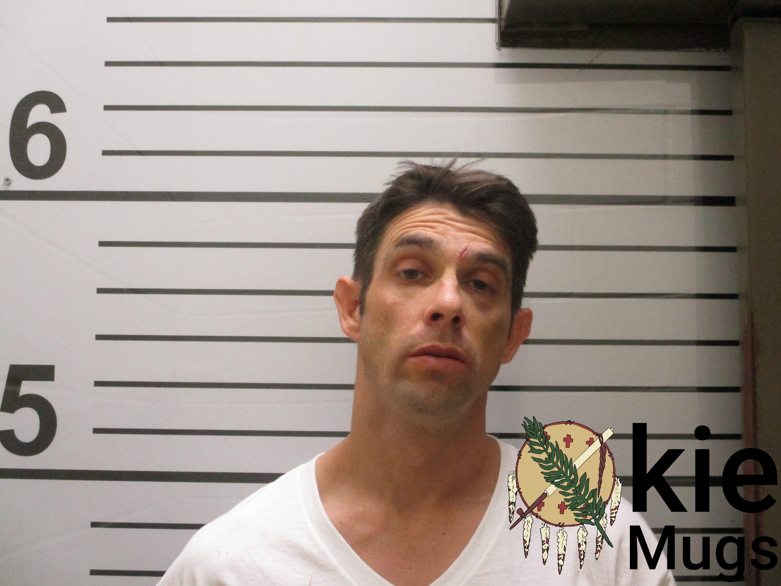 Booking photo of DUSTIN DON SECREST