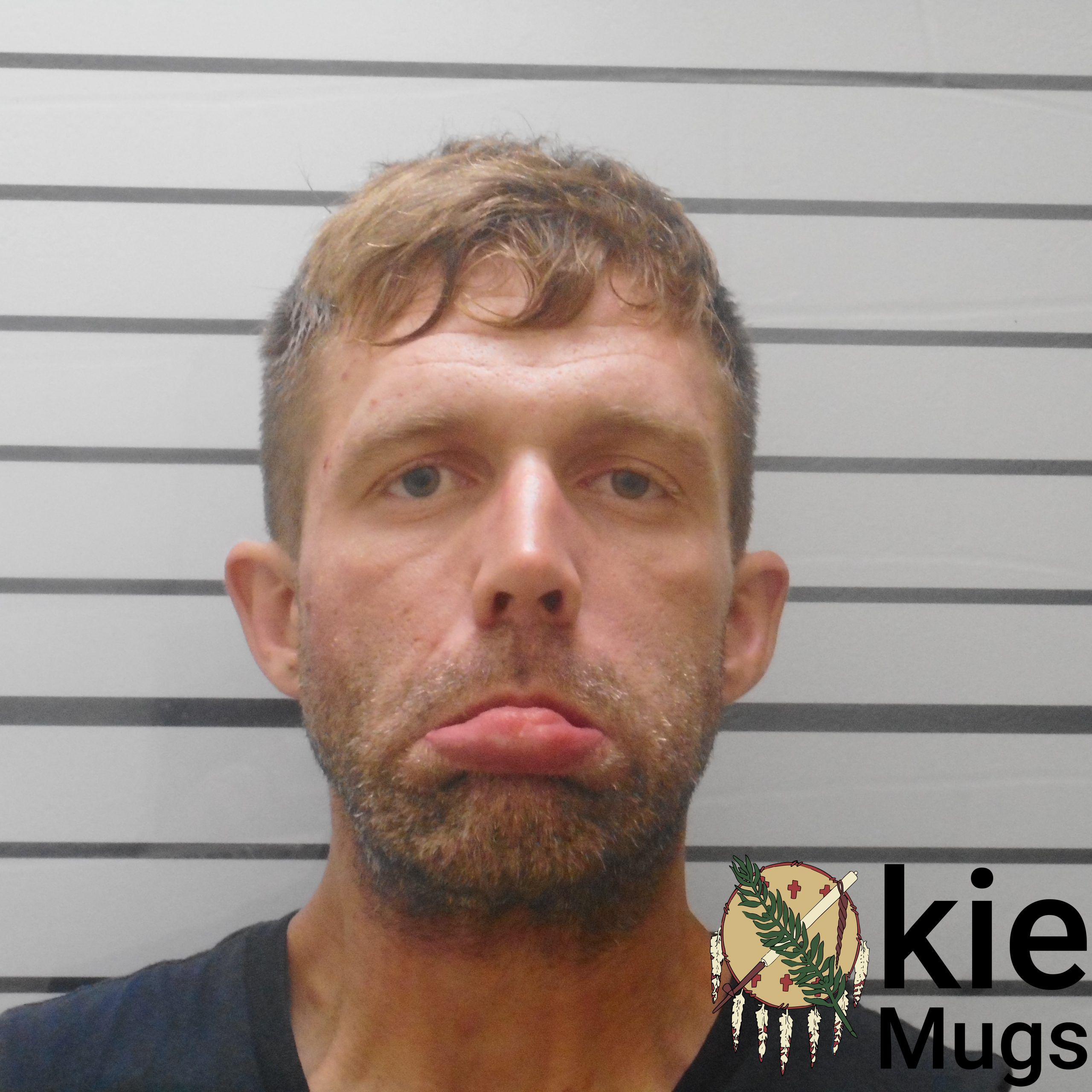 Booking photo of DUSTIN WILLIAM WASSON