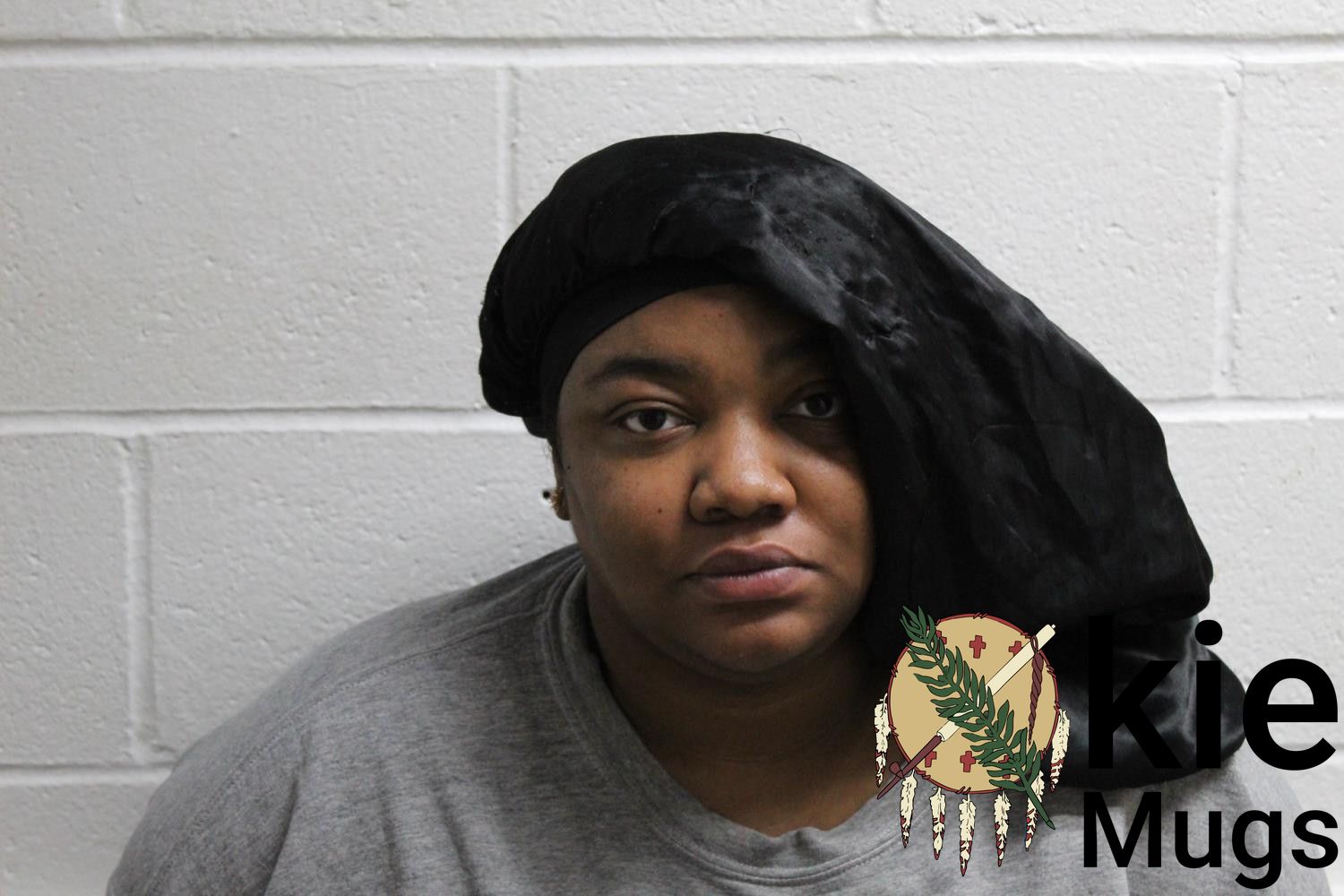 Booking photo of IRIS COXUM