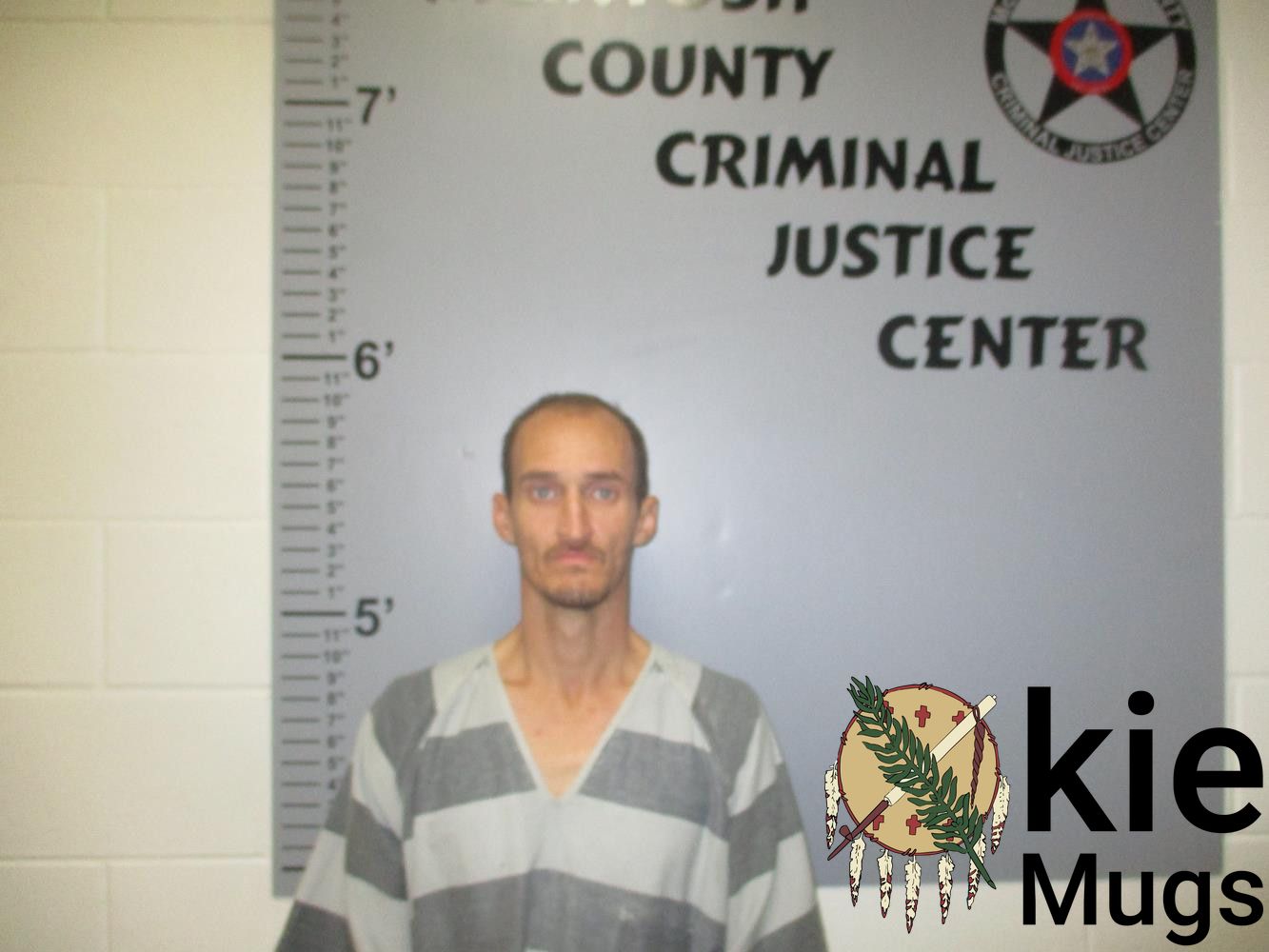 Booking photo of JAY THOMPSON