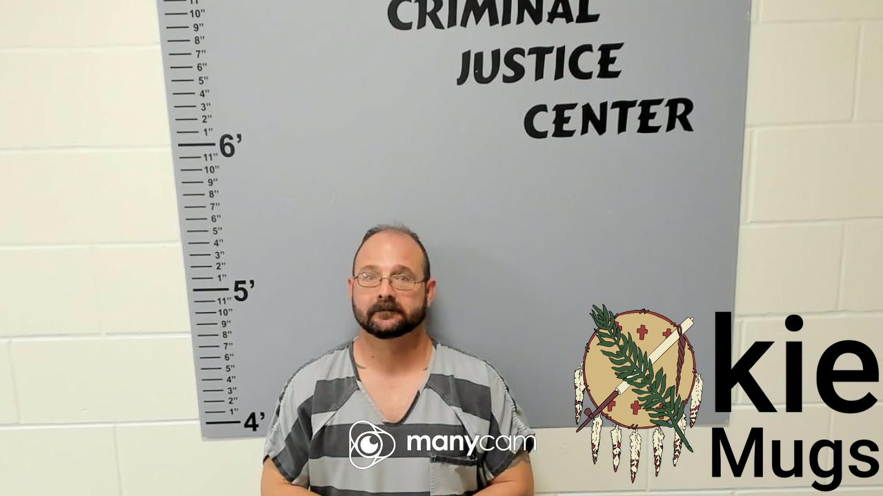 Booking photo of JOHN CARROLL