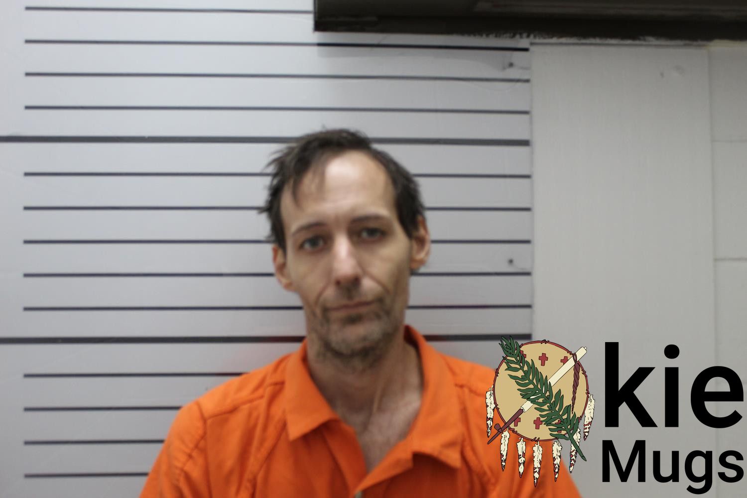 Booking photo of JOHN RAY (CHEROKEE) ROGERS