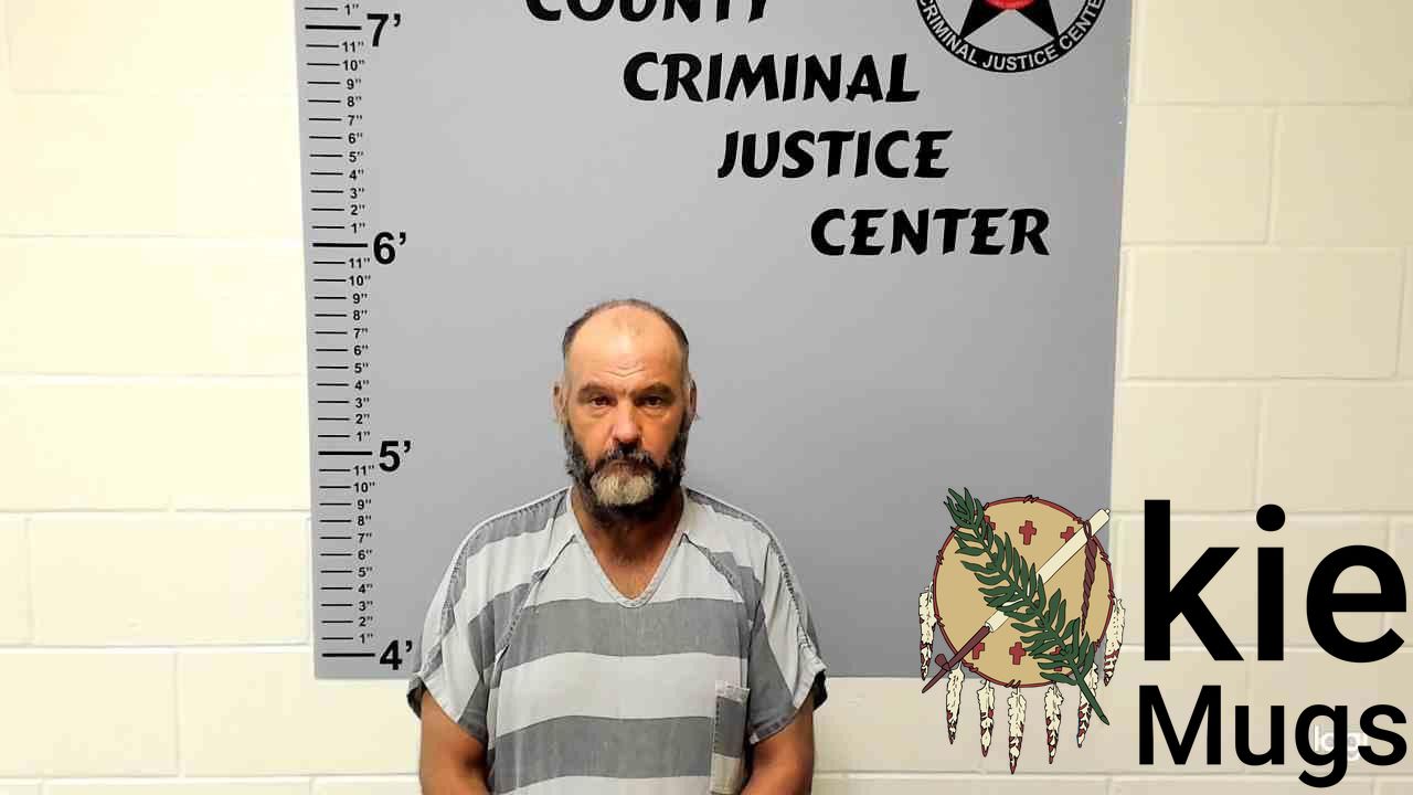 Booking photo of JON CARL MULLINIKS