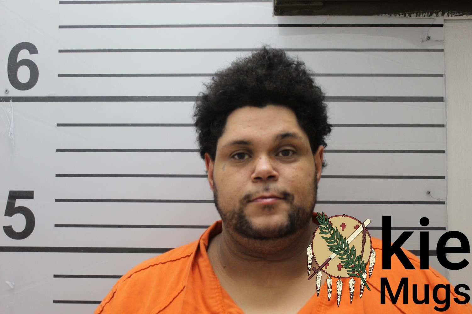 Booking photo of JONATHAN CHINOAN BUCHANAN