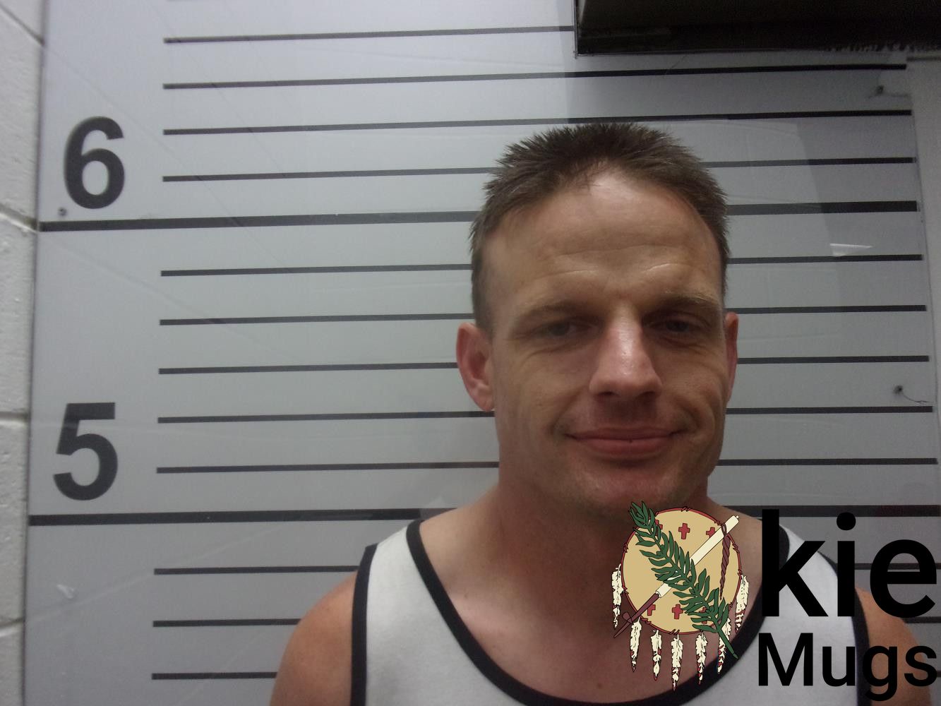 Booking photo of JONATHAN ZACHARY CHESNEY