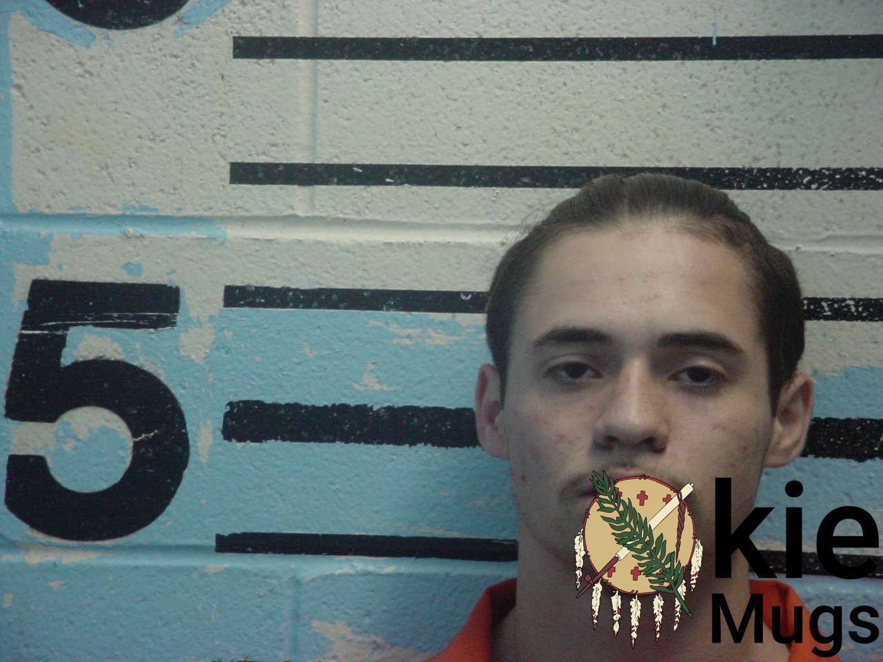 Booking photo of JONATHON E. JOHNSON