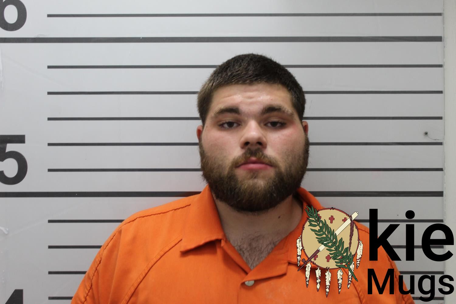 Booking photo of JUSTIN ADAMS