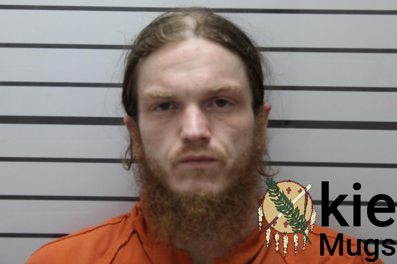Booking photo of JUSTIN BLAKE MONHOLLAND