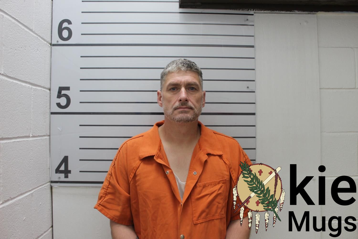 Booking photo of JUSTIN EUGENE MITCHELL