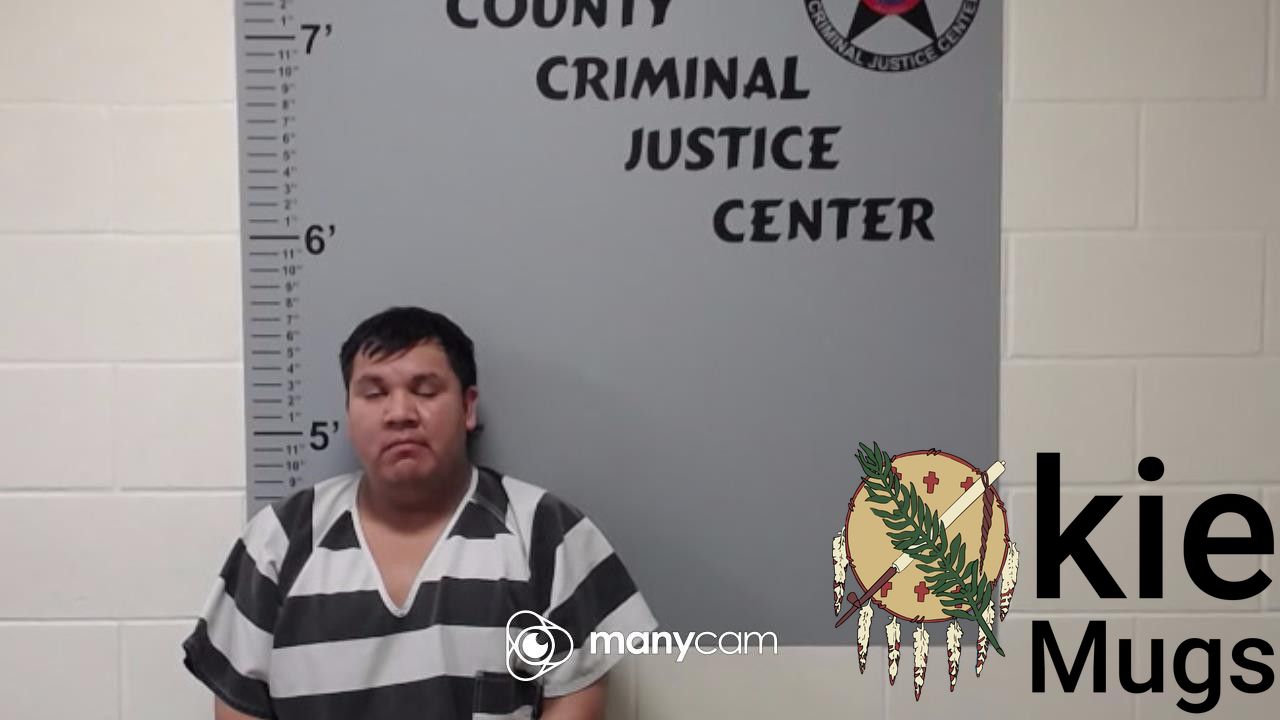 Booking photo of JUSTIN JONES