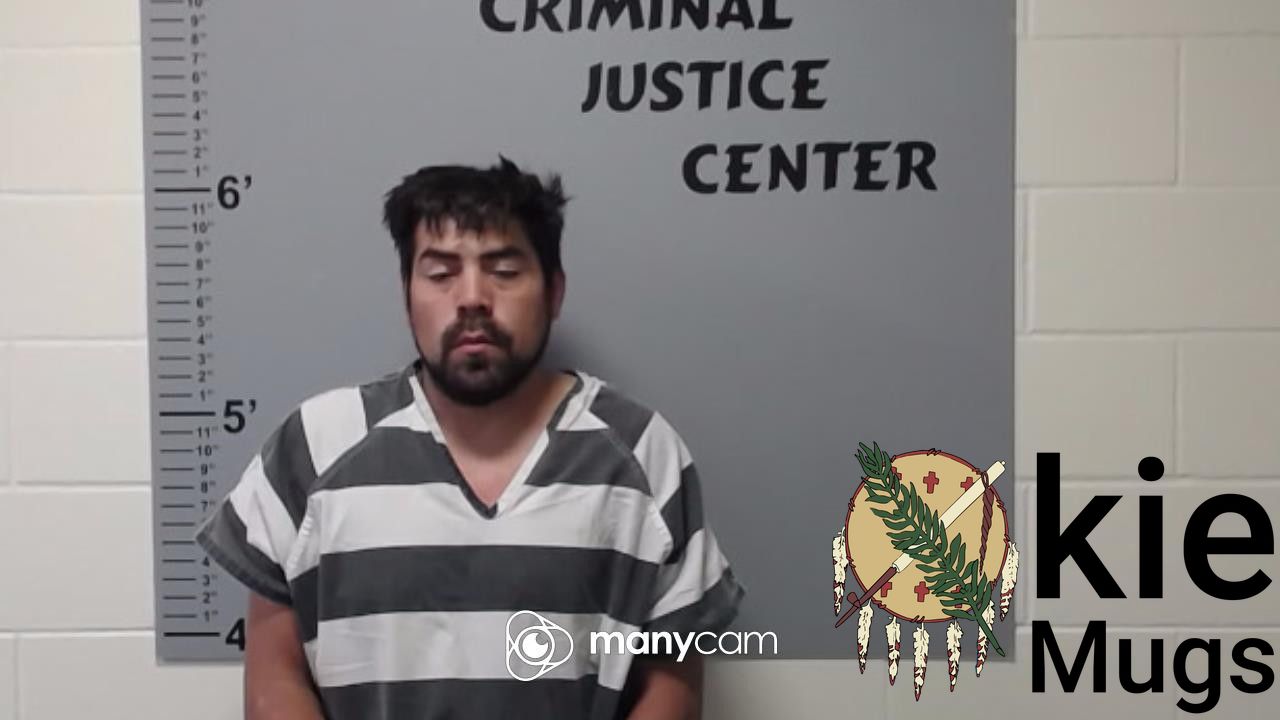 Booking photo of JUSTIN KYLE BURGESS