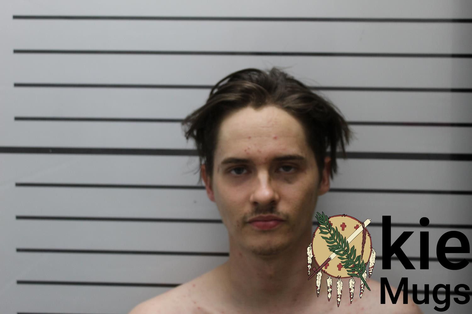 Booking photo of JUSTIN LEVI DUTTON