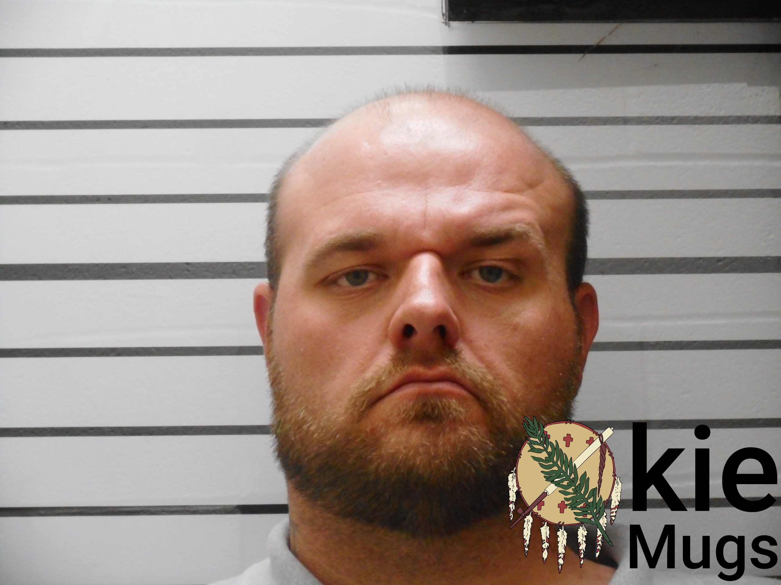 Booking photo of JUSTIN ROBERT HENDERSON