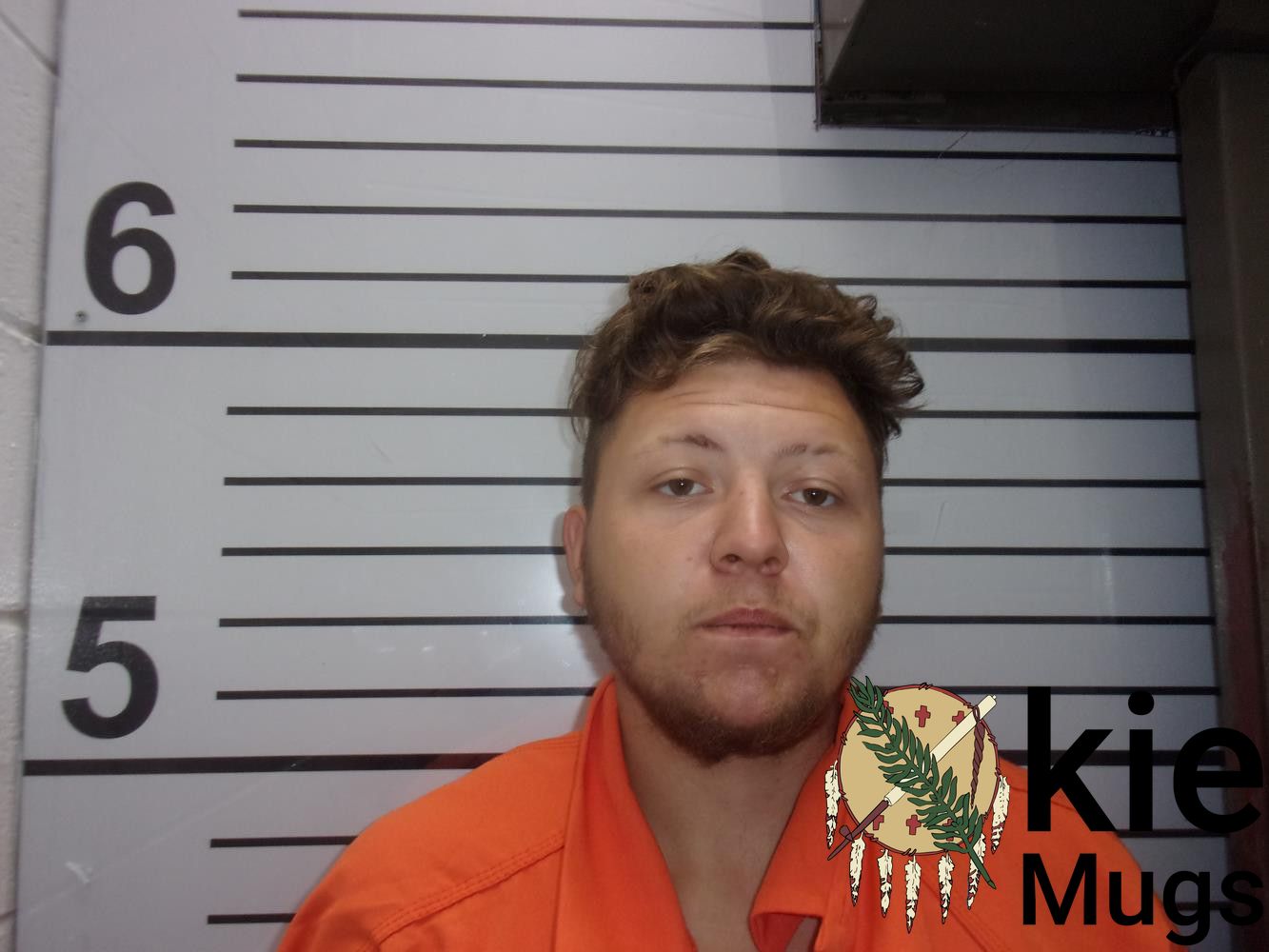 Booking photo of LOGAN WILLIAM WARREN