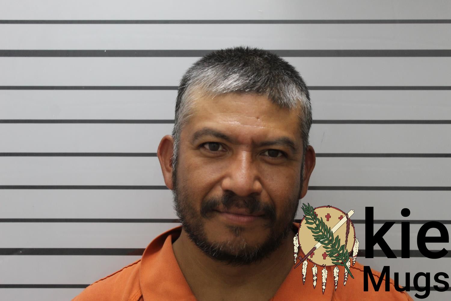 Booking photo of MANUEL DELGADO