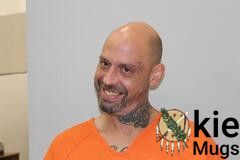 Booking photo of RAYMOND AUSTIN HOUCHIN