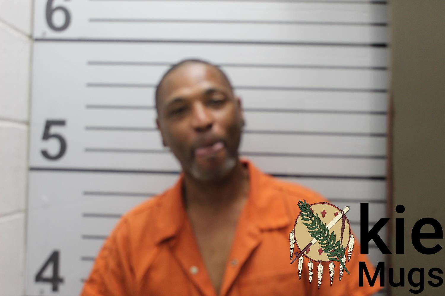 Booking photo of RAYMOND ISIAH HUGHES