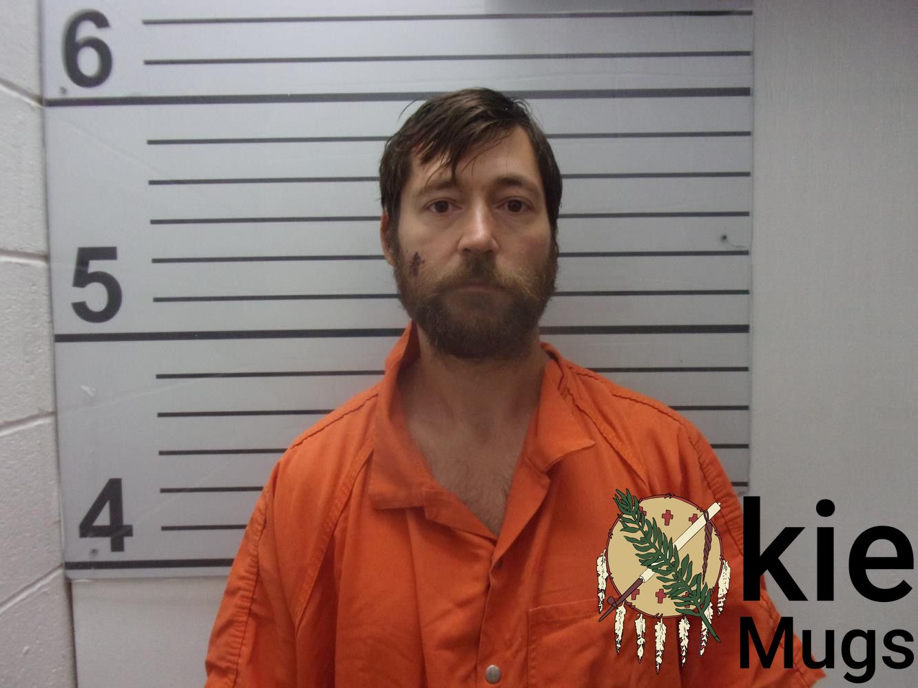 Booking photo of THOMAS ADAM
