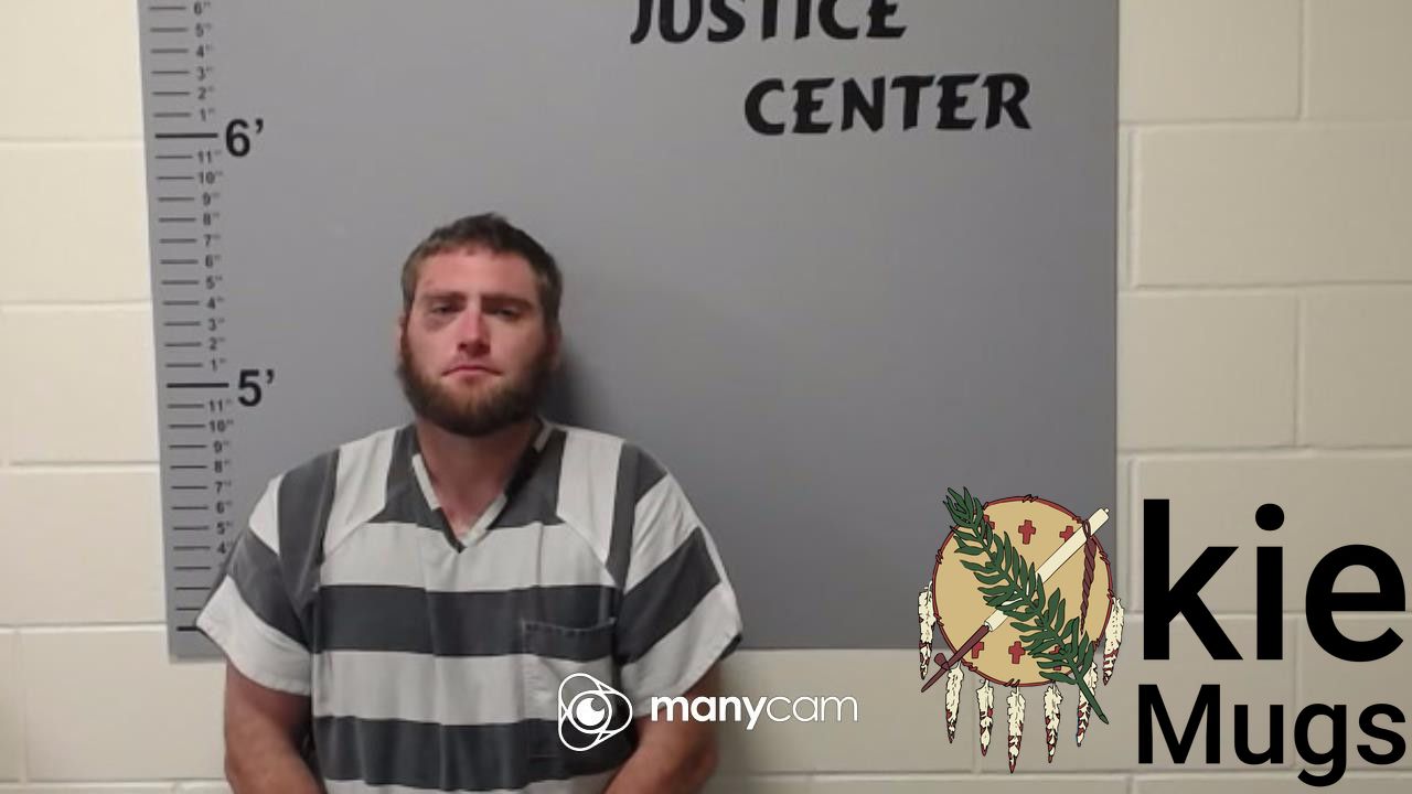 Booking photo of TRAVIS AARON BROWN
