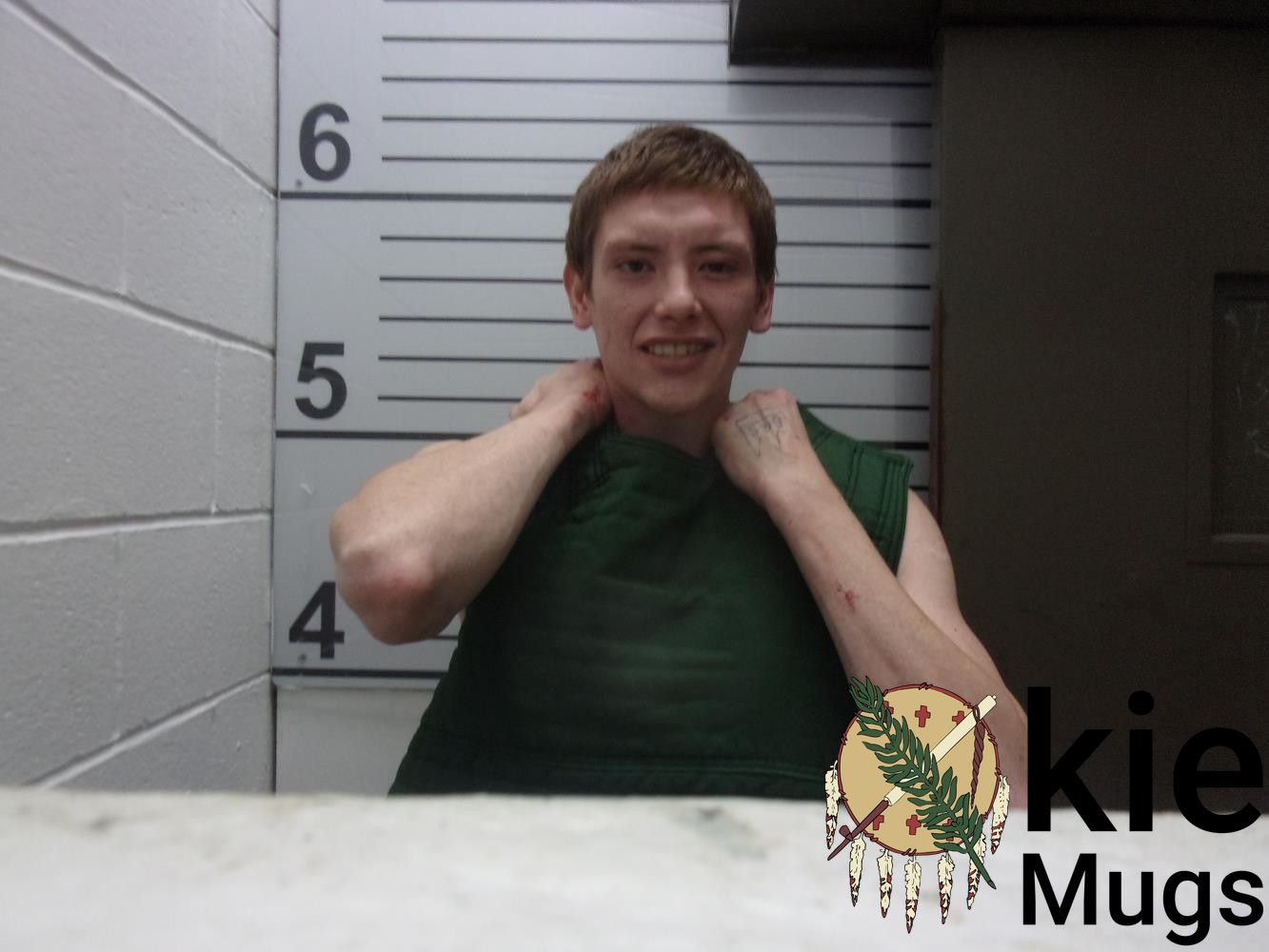 Booking photo of TYRON SITTINGHOLY